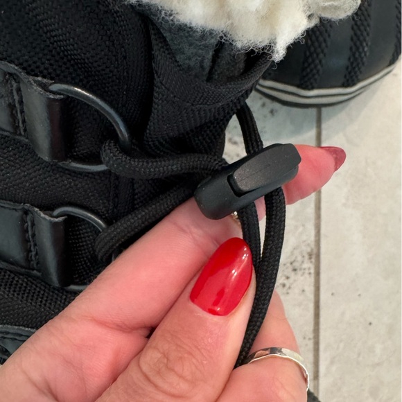 Sorel Kids’ Yoot Pac Waterproof Snow Boot Black and Faux-Shearling - Picture 9 of 9